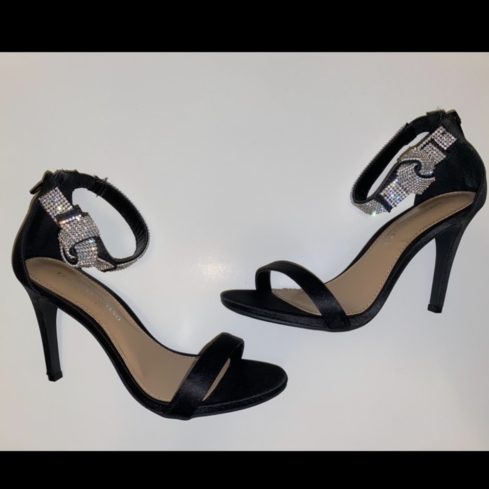 Black high heels with silver diamond ankle straps